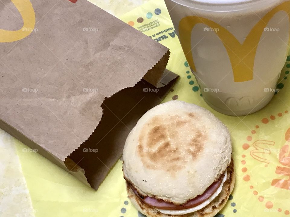 McDonald’s Egg McMuffin and a drink flat lay