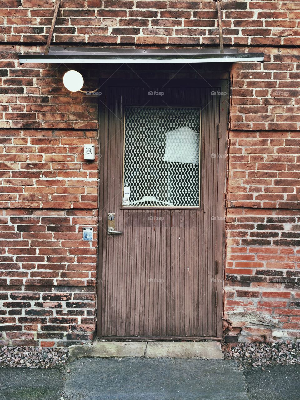 Brick wall with wooden door 