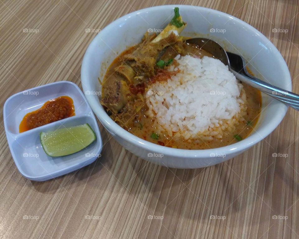 Delicious goat curry on the table