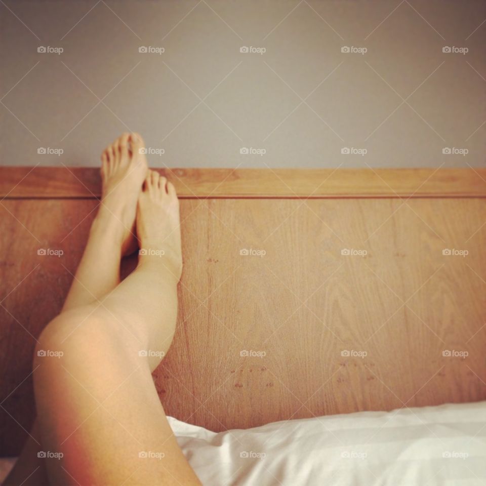 Legs in bed