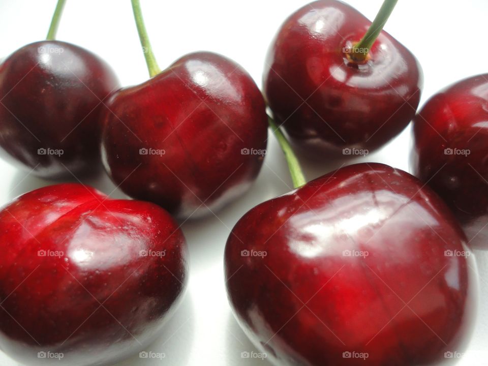 red cherry healthy food white background