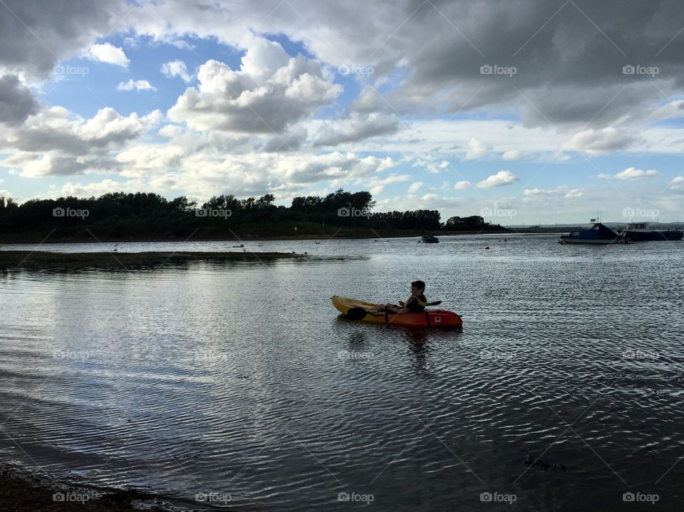 Boy on a kayak