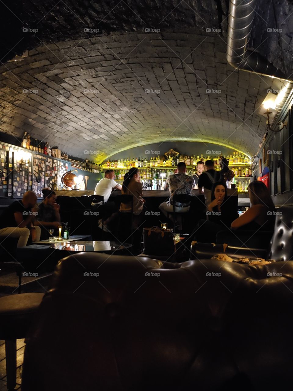 Vibes from the 20's, relaxed and sophisticated atmosphere of an underground speakeasy. The barber's shop, Rome.