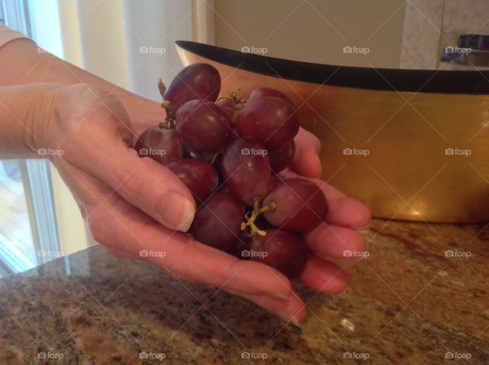 A handful of juicy red grapes.