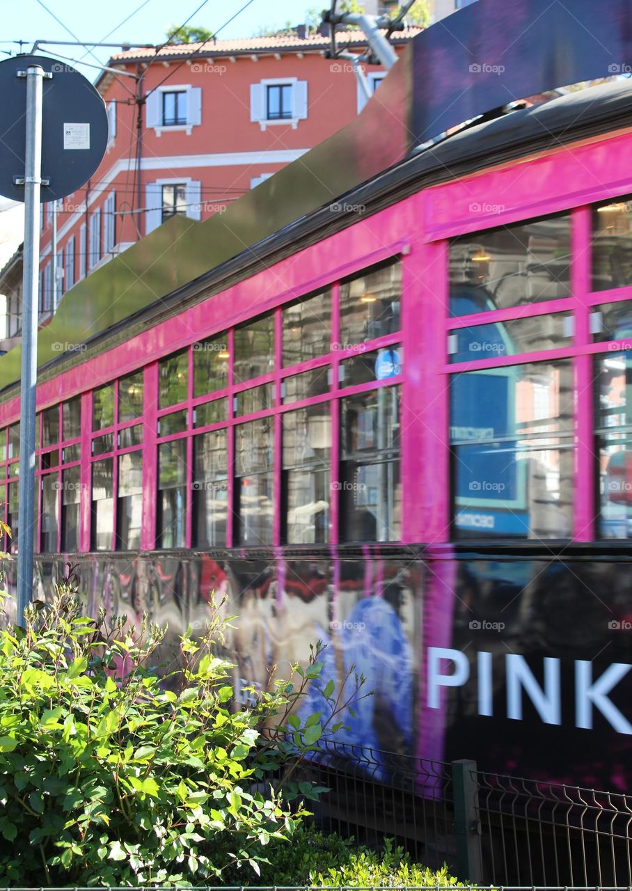 Cityscape.  Close up of a beautiful pink tram