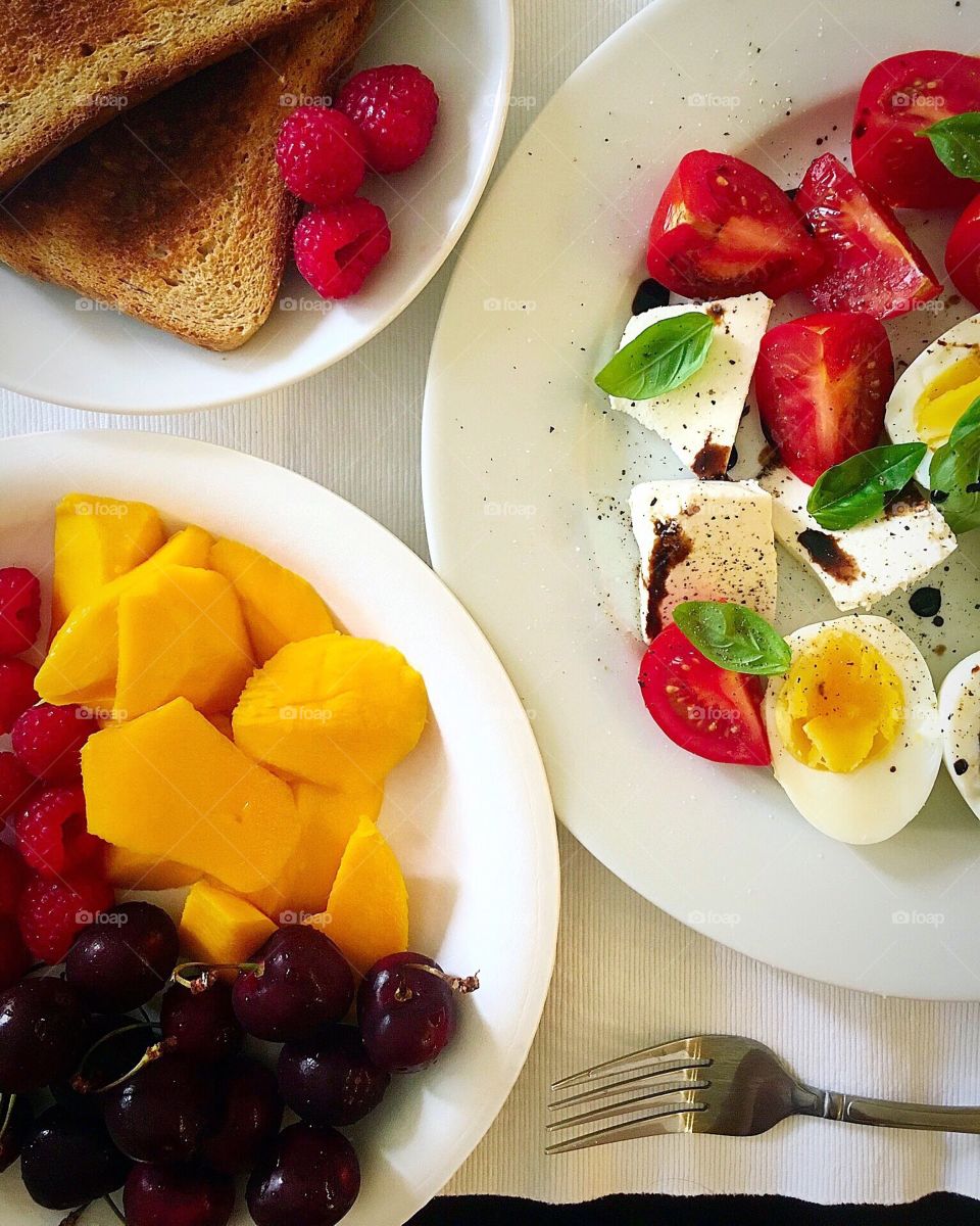 Fruits and eggs for breakfast