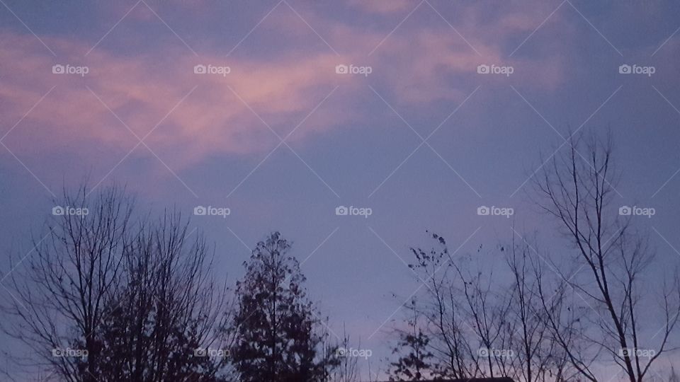 pink clouds at sunset after the rain