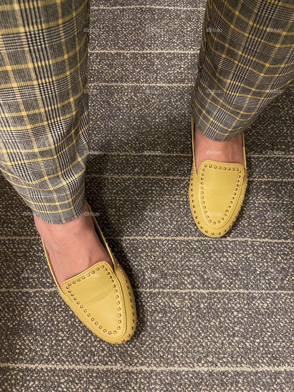 A photo of my gray and yellow plaid pants and my yellow shoes. Yellow is an uplifting color to work into your wardrobe. 