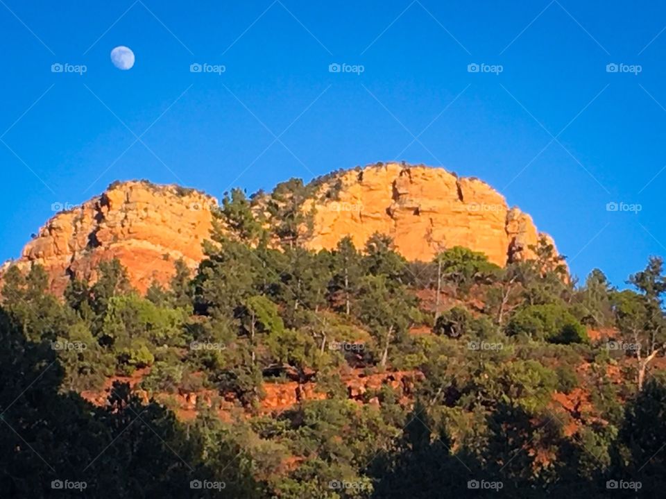 Moon over Sedona red rocks