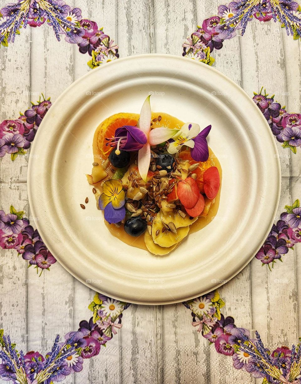 Fruitsalat with edible flowers