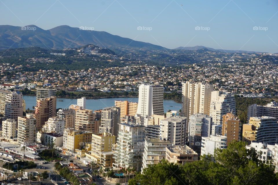 Skyscrapers#buildings#seaview#mountains#sky