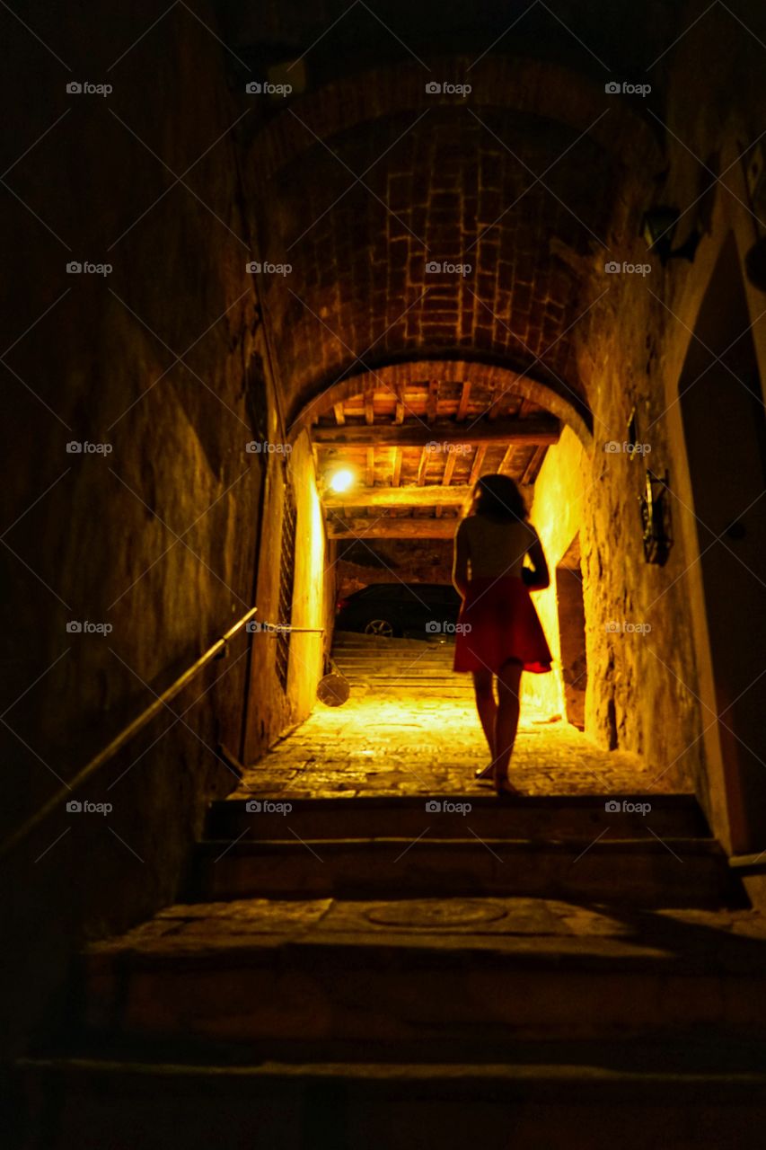 Walking towards to light in tunnel