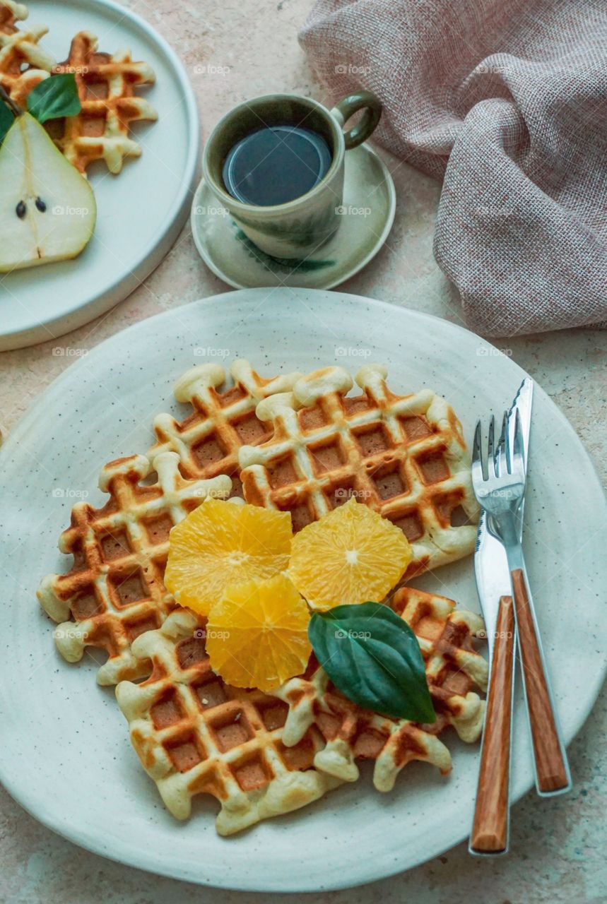 waffle dessert with a cup of coffee