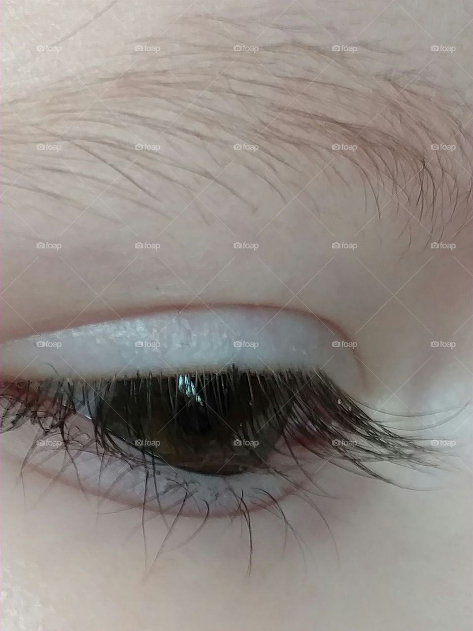 toddler girl with beautiful eyelashes