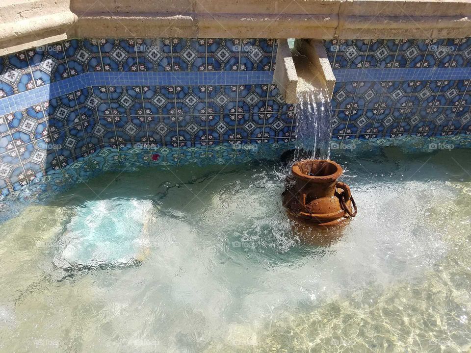 Water Pouring from a Fountain