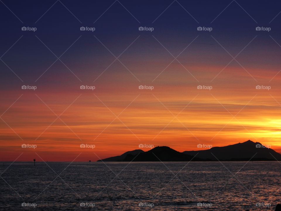 Dramatic sky at sunset over the sea