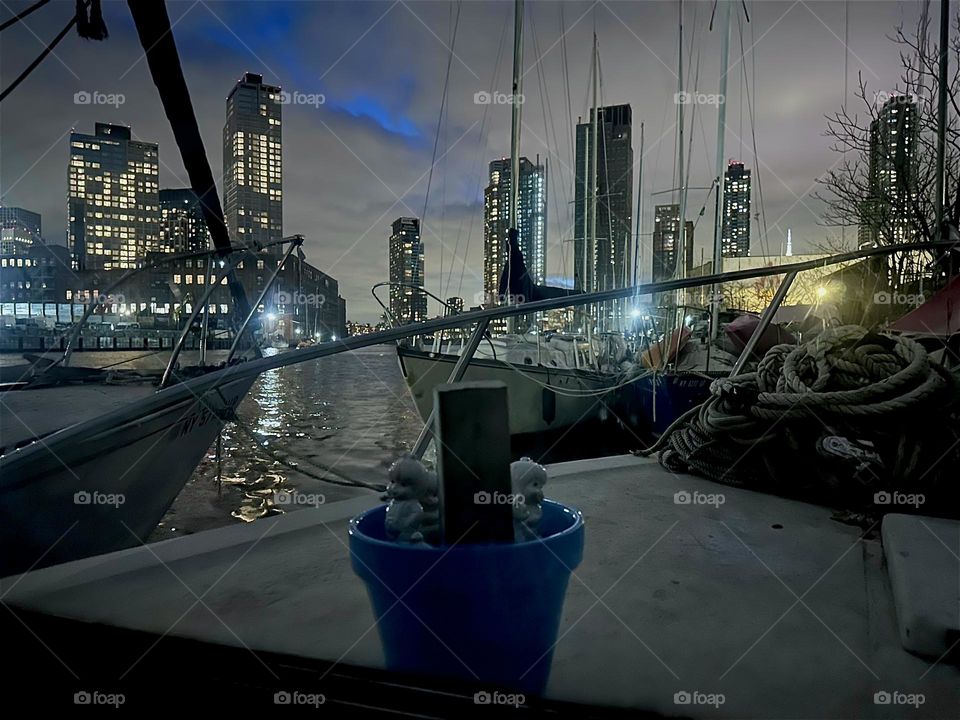 This is the view through the window of “Salvation” at “Newtown Creek” in LIC, Queens. The “28 foot 1969 Luhrs” cabin cruiser is home to myself and my longtime partner “Timothy Trespas”. 2024. Hypnotic Productions