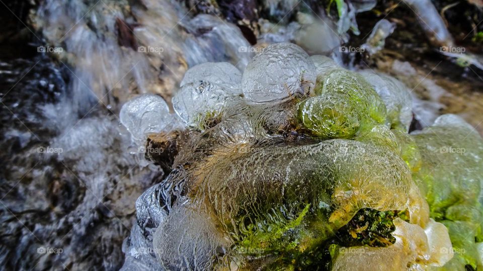 Small stream with artful glaciation.