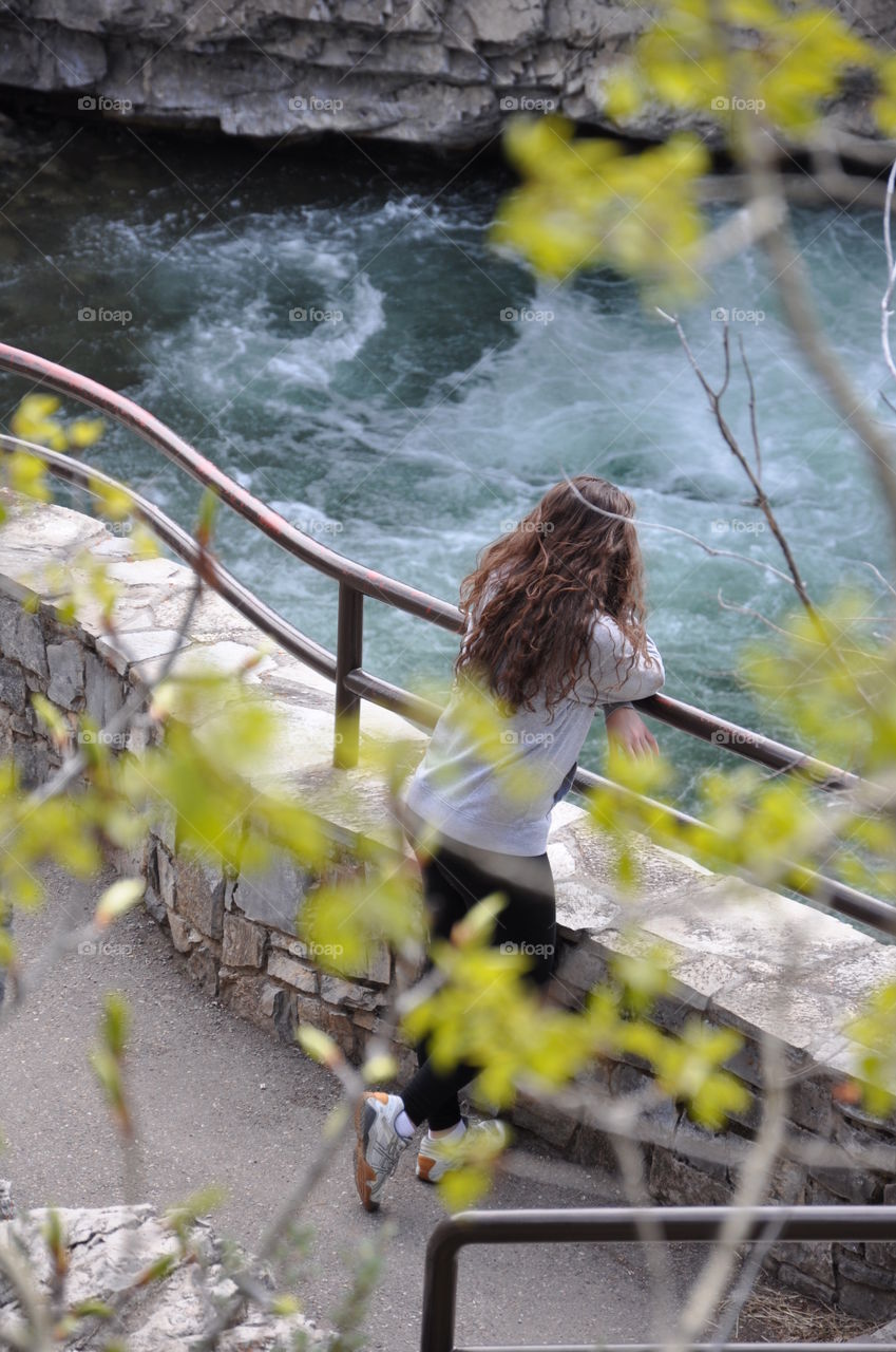 Girl watching river