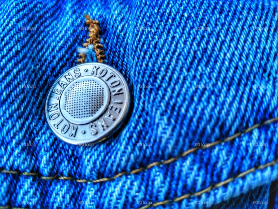 Jeans jacket button