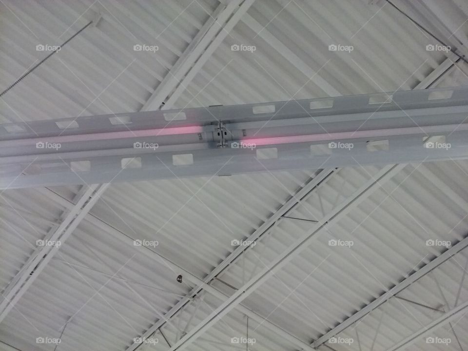 pink fluorescent light ready to burn out....it's at it's end of it's cycle!