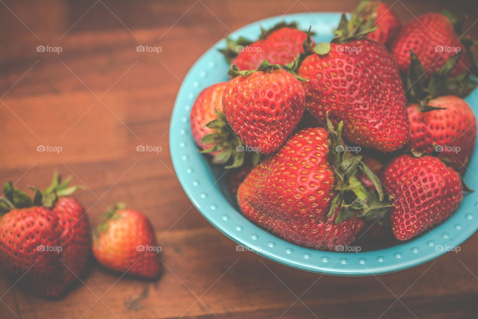 Fresh Strawberries in a Blue Bowl