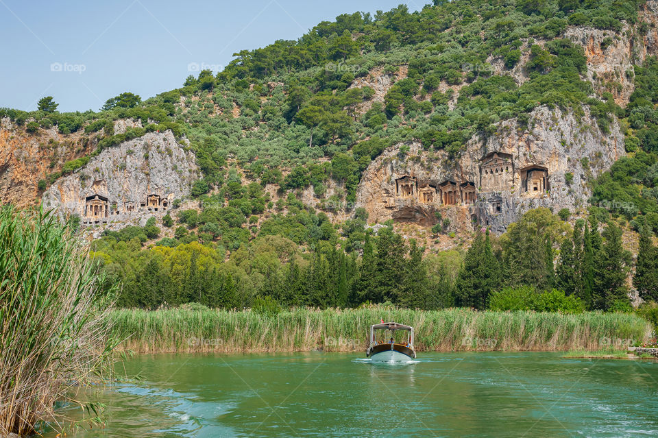 Water taxi service on Dalyan Tombs. Bogazi River delta. Turkey.