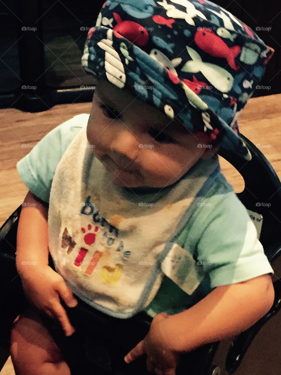 Ten month old baby boy with a cute hat that happens to be my grandson. 