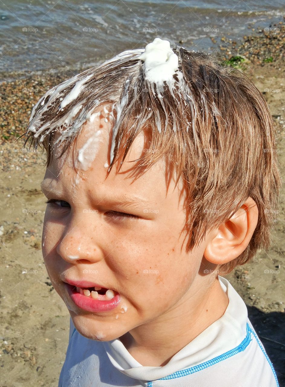 Funny Boy Goofing Off. Little Boy With Messy Hair
