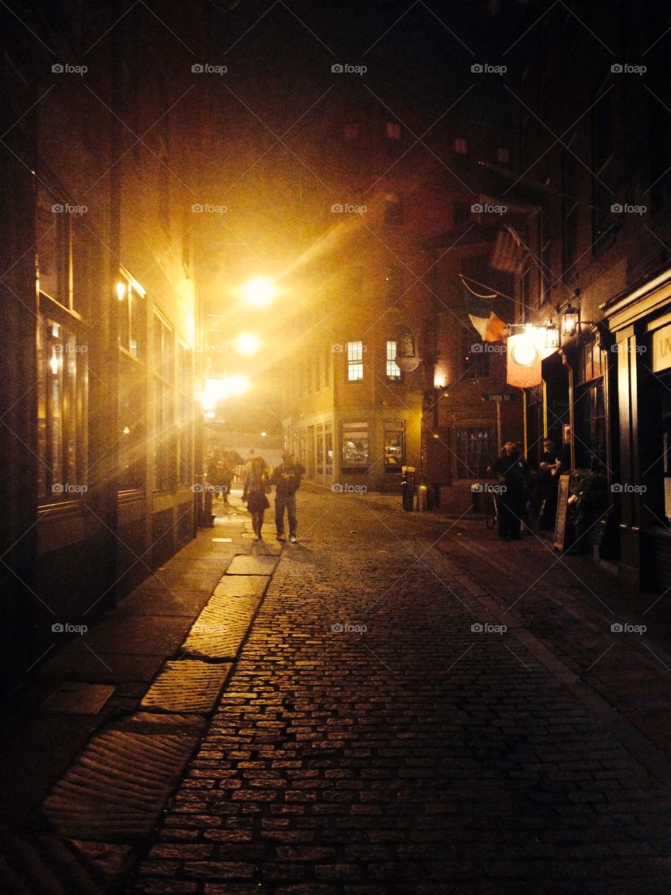 Cobblestone streets of Boston at night 
