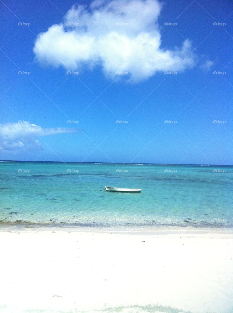 Sand sea and a cloud