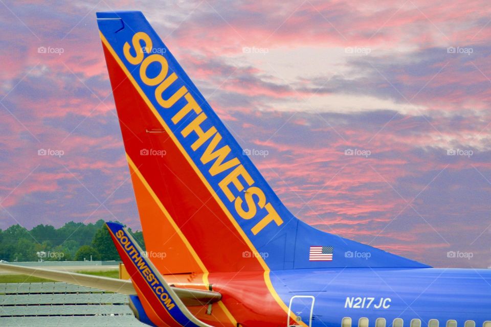 Southwest Airlines tail against a beautiful sunset 