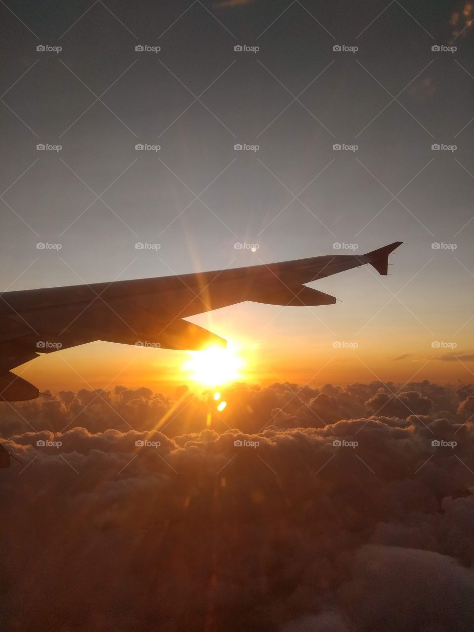 flying above the clouds