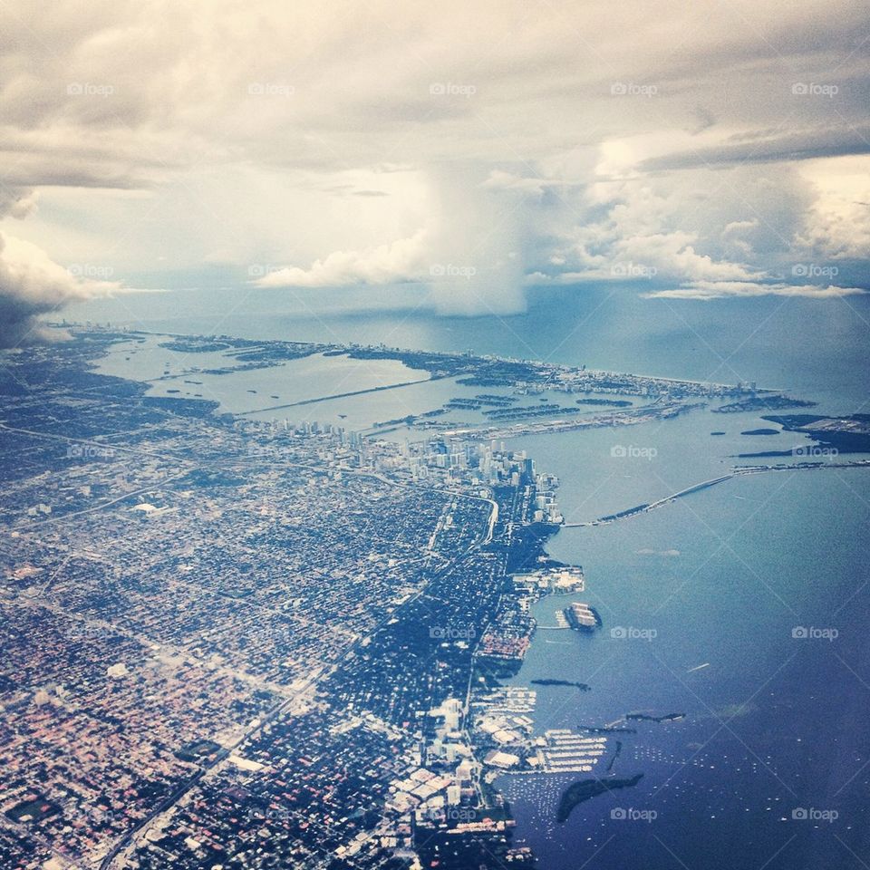 Flying over Miami. Rain is coming.