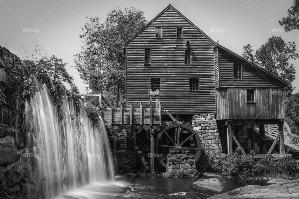Black and white of the only operational gristmill left in Wake County. Historic Yates Mill County Park in Raleigh, North Carolina. 