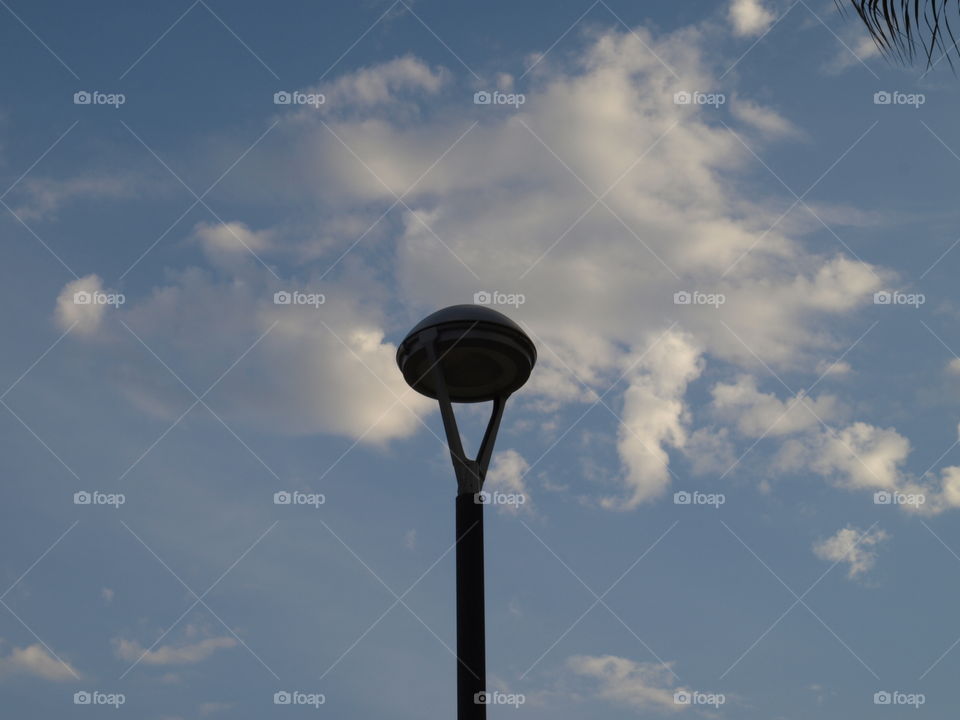 Lamppost and clouds