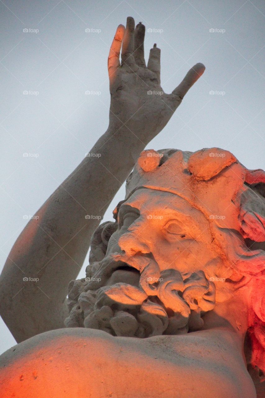 statue of a person in a garden