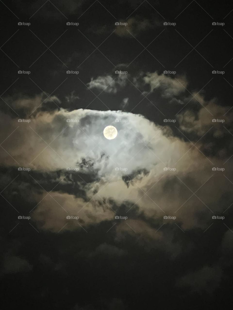 Full moon cloudy sky