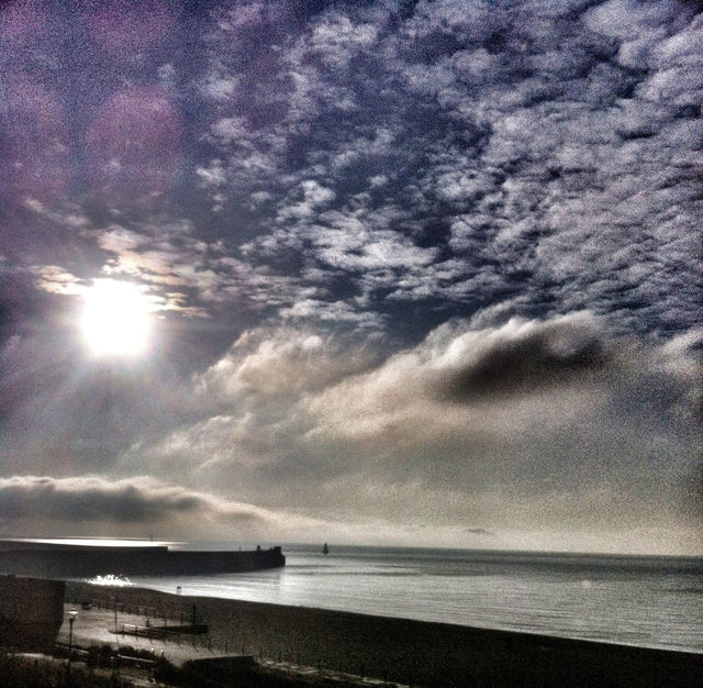 blue wall sun cloud by Fotofleeby