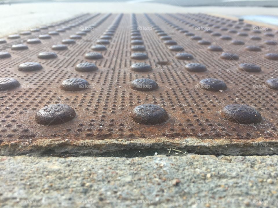 Dots on a sidewalk