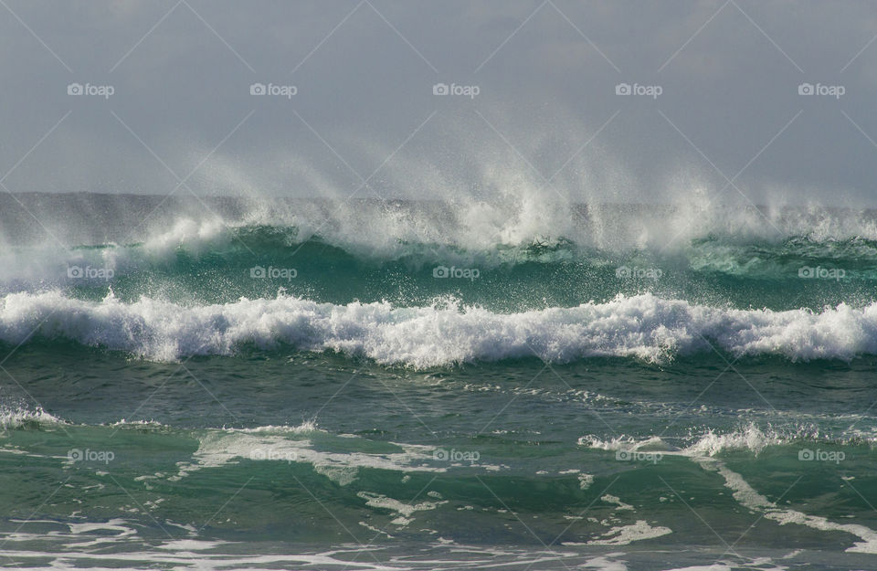 View of waves on sea during storm
