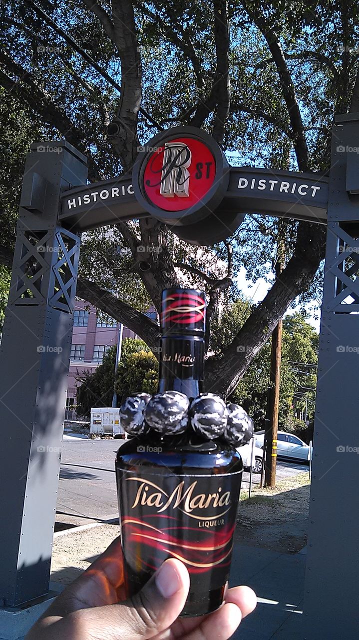 historic liqueur sign. riding my bike down our street