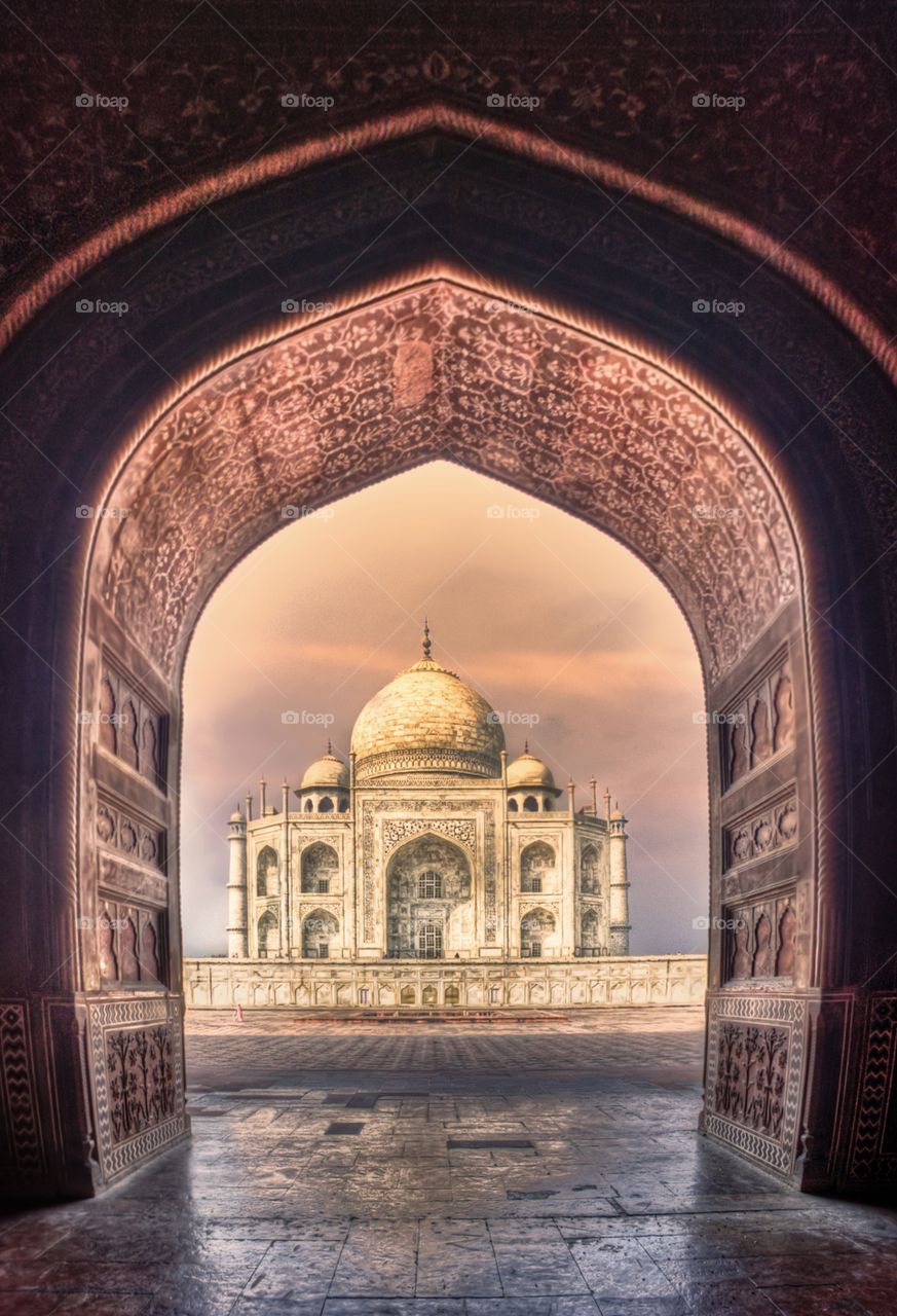 Taj mahal framed in the morning sunrise