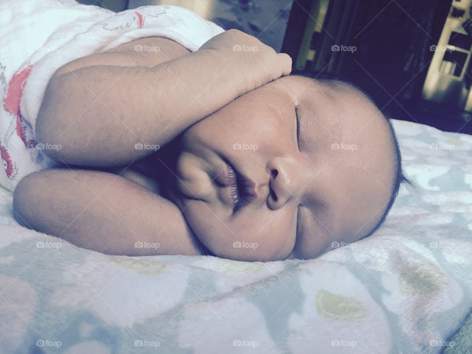 Let me sleep a little longer!. My handsome Eskimo boy sleeping peacefully.