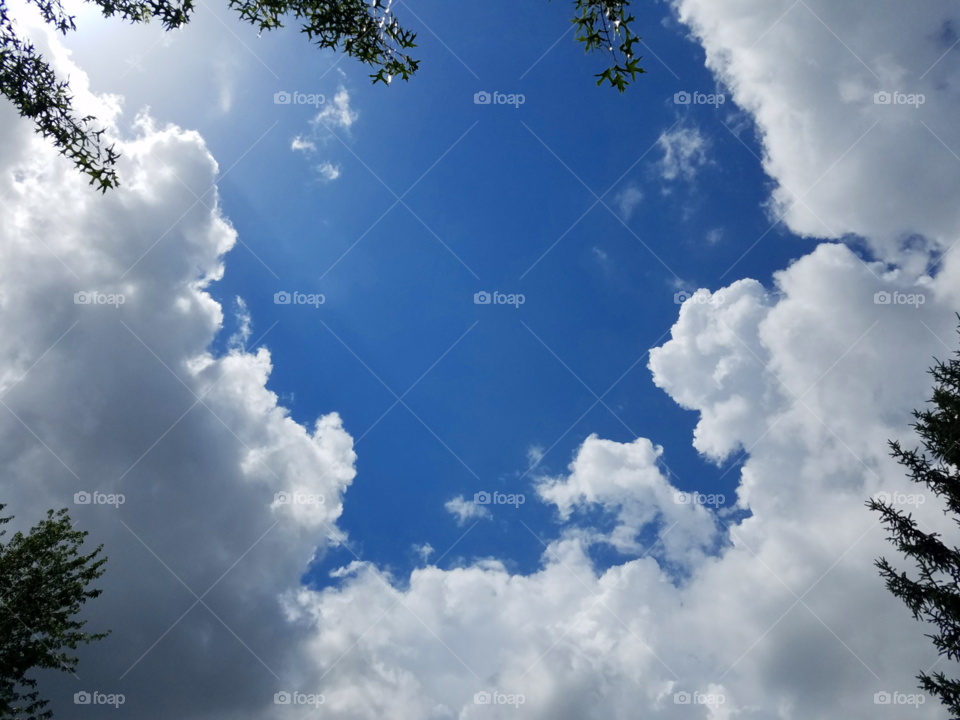 A break in the clouds showing the brilliant blue of the day