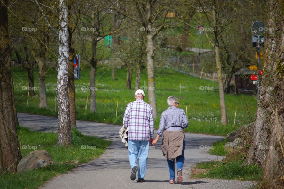 Old Couple Taking Walking
