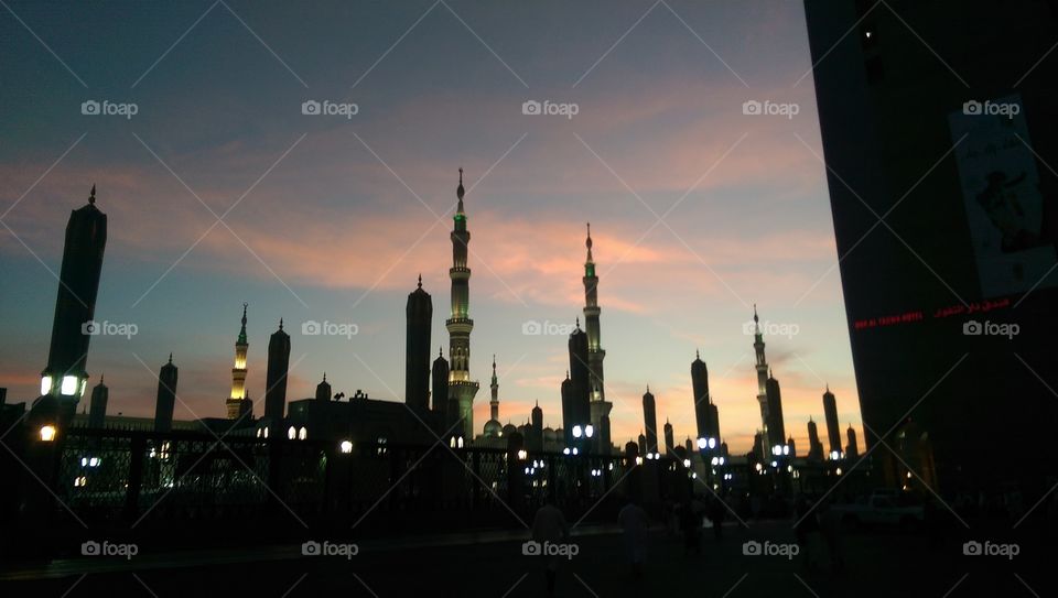 Silhouette of the Prophet's Mosque at sunset in Medina, Saudi Arabia