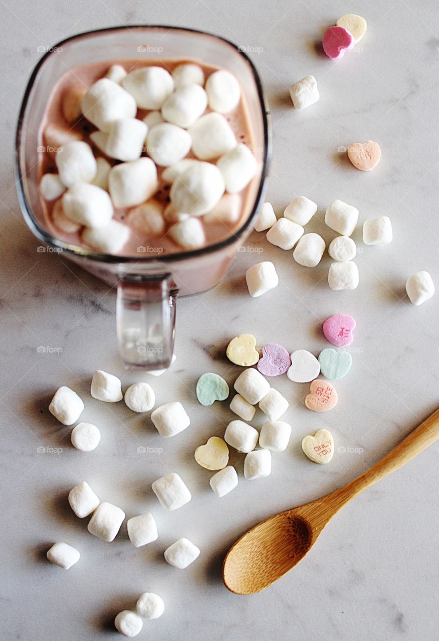 Valentine's Day hot chocolate with marshmallows and heart candy 