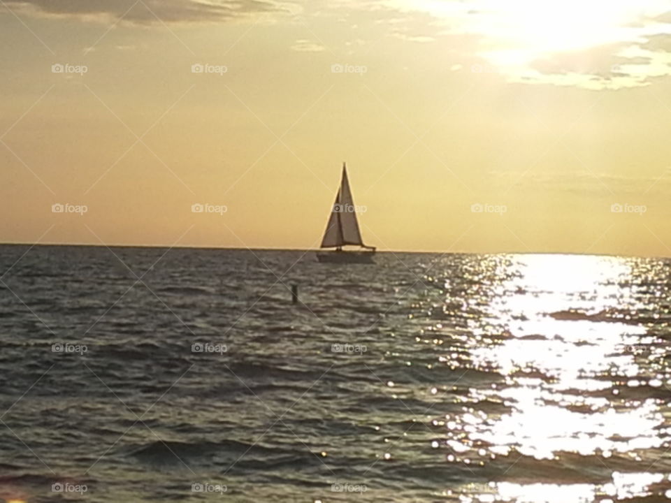 sailing at sunset. at Casey key, florida at nokomis beach
