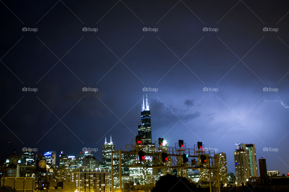 Light show over Chicago . Taken from my rooftop in the West Loop during a storm in July. 
